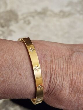 Gold Floral Accent Hinged Bangle Bracelet